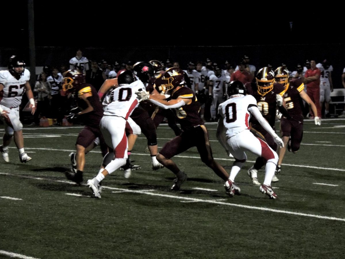 MHS Football Loses Final Conference Game to Chippewa on Senior Night
