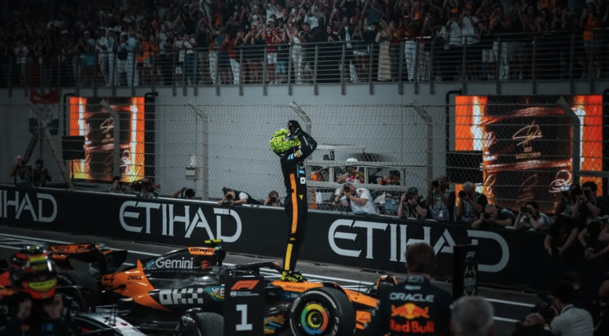 Norris standing on his McLaren after securing his Drivers Championship in Abu Dhabi-
Photo from Norris’ Instagram
